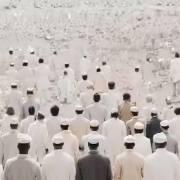 a large group of people walking in a crowd