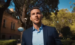 a man with his eyes closed and looking up