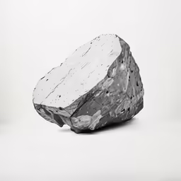 a rock made out of rocks and gravel on a table