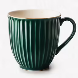 a coffee cup with stripes on it sitting in a white background