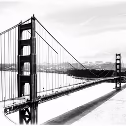 the golden gate bridge is shown against the cloudy sky