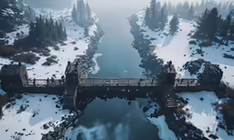 an aerial view of the bridge in a snowy area