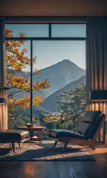 a living room has a view of the mountains