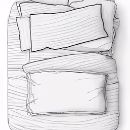 four pillows are lined up together on a bed