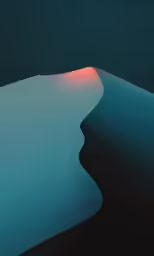 a red object is shining on a blue, dark background