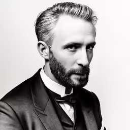 a bearded man is looking forward wearing a suit