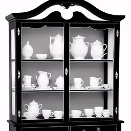 a black and white photo of a china cabinet