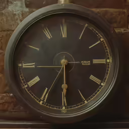 this is a clock on a brick wall