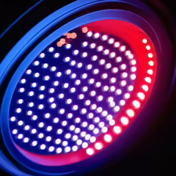 a close up of a red and blue lights