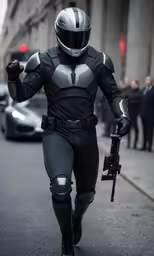 man in a silver helmet with gun and rifle