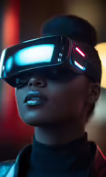 a young woman wearing the same virtual reality helmet, as she looks into the distance