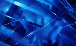 abstract blue shapes and lines make up the backdrop
