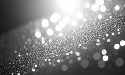 an abstract picture shows many circles of white lights