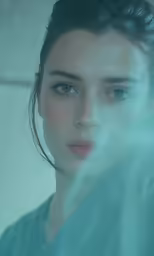 a young woman is shown in the blurry photograph