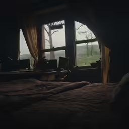 a bed with two night stands and two windows with trees outside