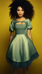 the image shows a beautiful young woman with her hair styled in a green dress