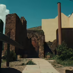 a building is being built out of rocks and brick