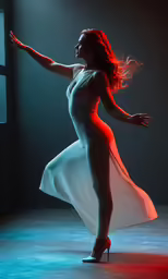 a woman is performing in an artistic light painting