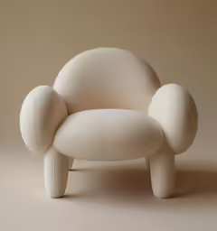 a white chair sitting on top of a brown surface