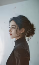 an image of a person with black hair and makeup