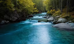 there are many large rocks on this river bank