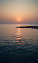 a large body of water sitting under the sun