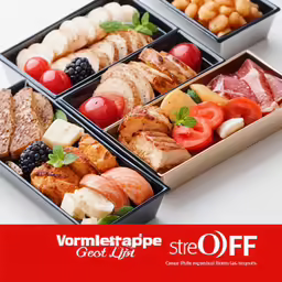 a close up of four boxes of food