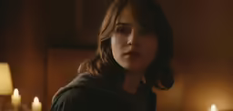 a close up of a person near many lights