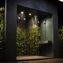 an illuminated wall in the entrance of a building
