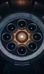 an overhead view of the ceiling and metal pipes