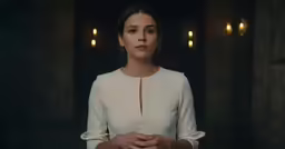 an image of a beautiful woman dressed in white