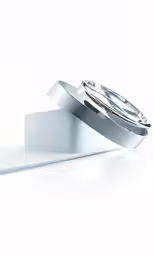 three rings sitting on top of a white background