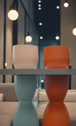 the glass table is near a couple of lights
