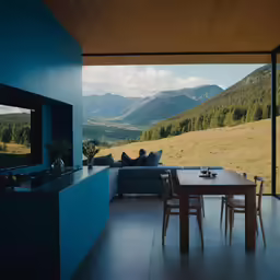 the view from inside the home shows the living room, dining and patio