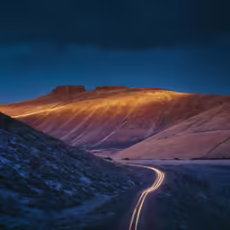 long straight road passing by in a desert landscape