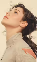 an artistic photograph of a girl wearing a turtle neck sweater