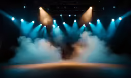 a stage with smoke coming out the back