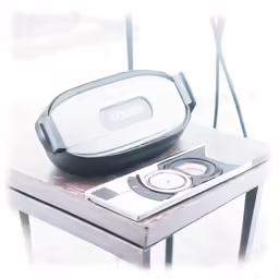 a portable device sitting on top of a wooden table