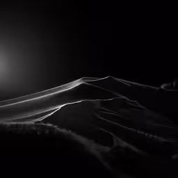 the moon is behind the snowy slopes of a mountain