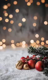 a small fir tree surrounded by ornaments
