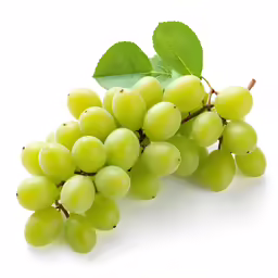 green grapes with leaves on white background