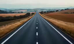 a long, empty highway stretching into the distance