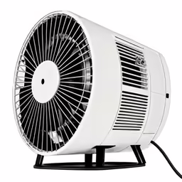 a large white fan sitting on top of a metal stand