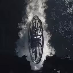 a close up of an upside down ferris wheel