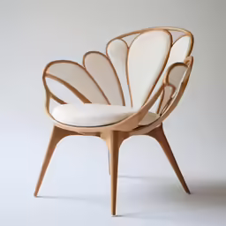 an egg chair with a butterfly wings design on top of it