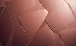 a wall of mirrors are arranged in the shape of an abstract diamond