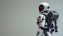 a robot wearing an all white space suit