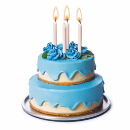 two layered cake with candles in the middle of it