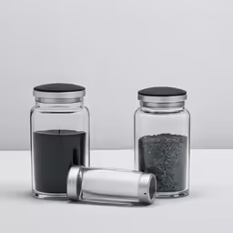 salt and pepper shakers on top of white counter
