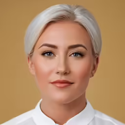 a close up of a person wearing a dress shirt